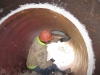 Grouting the new sluice pipe liner